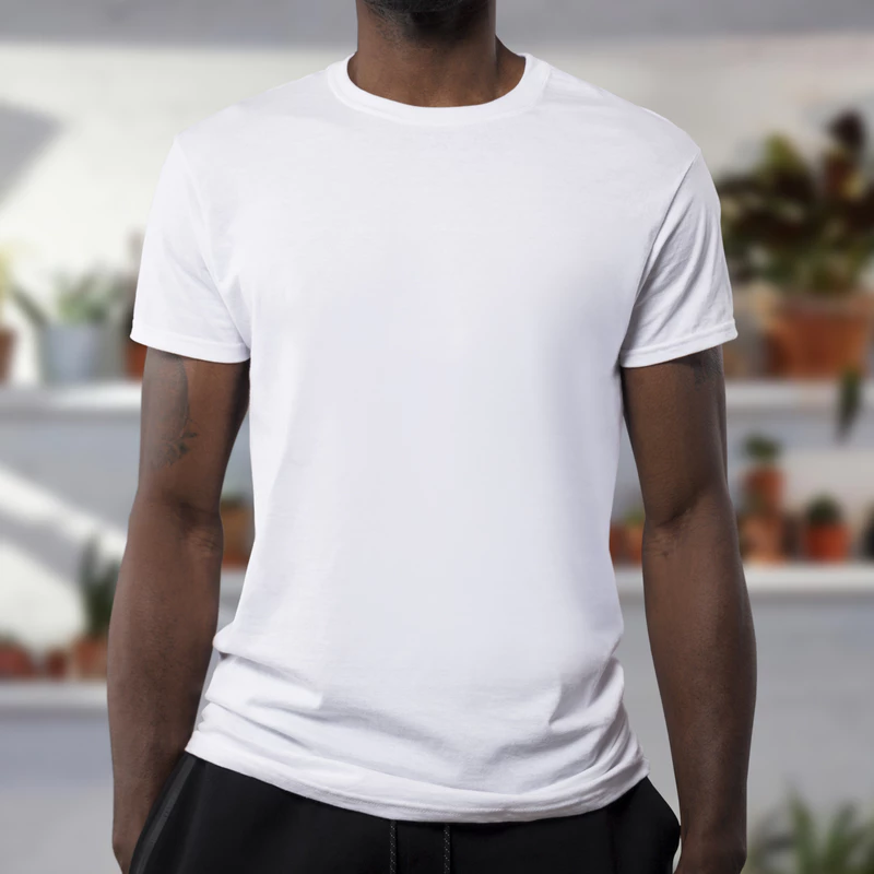 Our example image of a man wearing a white t-shirt.