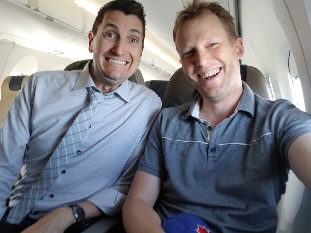 Scott Snowden and Marc Baron The Flywheel Strategic team on the plane to Boston to attend Progress Next 2018