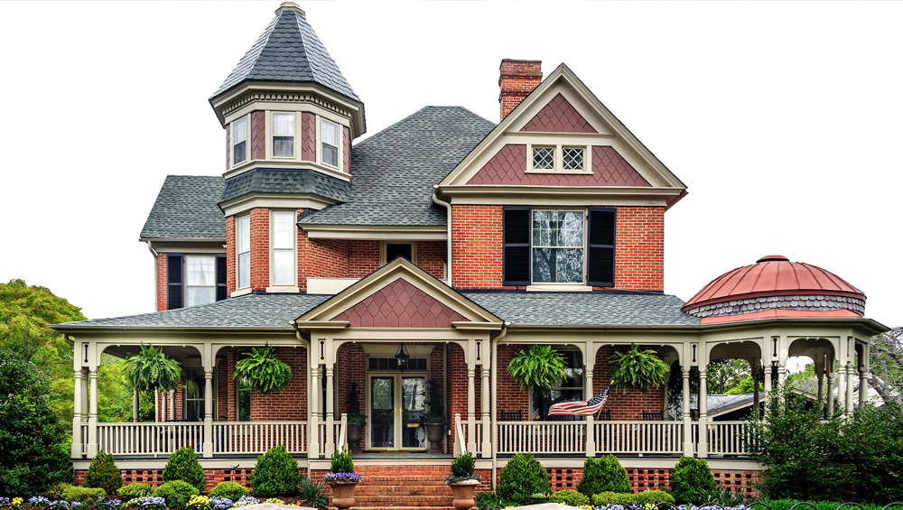 Our example image of a large white and brown house.